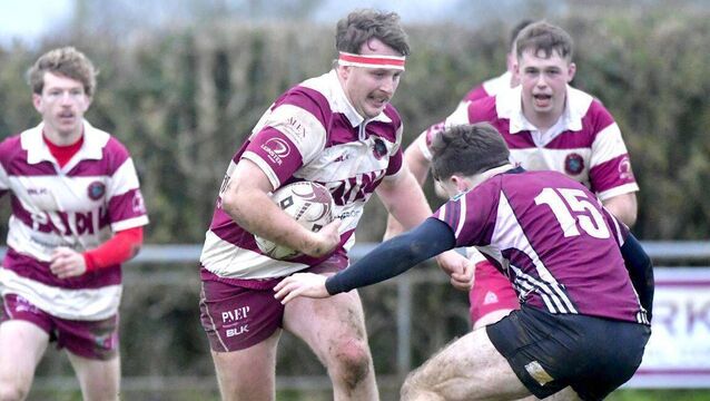 <p>Toby Neilson (Portarlington) is determined to ghet past the Rpscrea full back Photo: Denis Byrne</p>