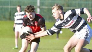 <p>Finn McLarnon (Portlaoise CBS) protecting this ball as Joe Hanrahan (St Kieran's) challenges Photo: Denis Byrne</p> <p>Finn McLarnon (Portlaoise CBS) protecting this ball as Joe Hanrahan (St Kieran's) challenges Photo: Denis Byrne</p>