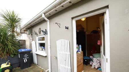 Mother and kids living in garden shed, waiting for social housing