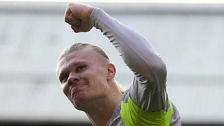 Erling Haaland scores twice as Manchester City close within two of Arsenal