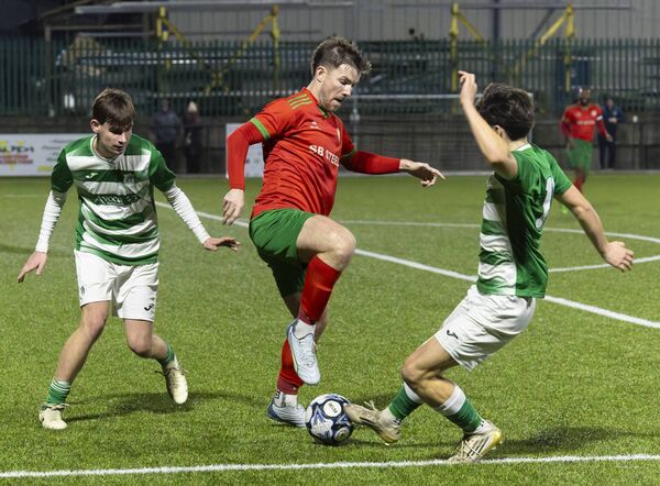 St. Patrick’s Josh Moore tries to get the ball away from Killeshin’s Radoslaw Witkowski and Adam Farrell. Pic: Michael O'Rourke St. Patrick’s Josh Moore tries to get the ball away from Killeshin’s Radoslaw Witkowski and Adam Farrell. Pic: Michael O'Rourke