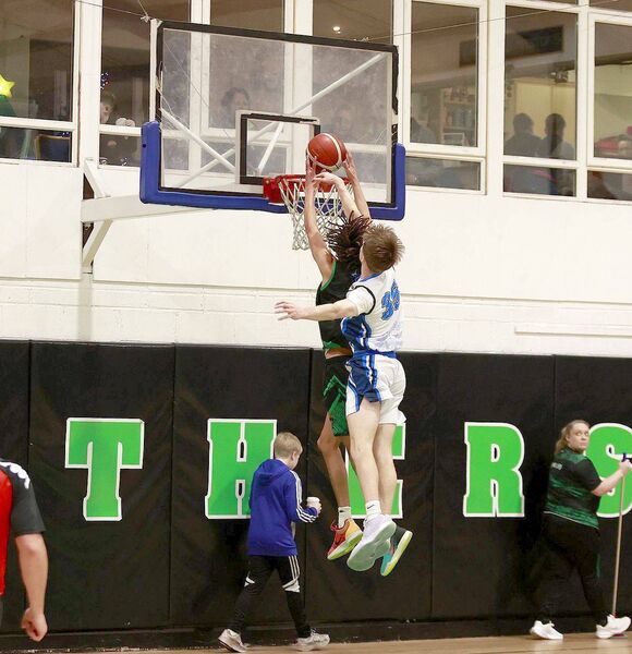 Jayden Umeh finds the basket for Portlaoise Panthers despite the best efforts of Russell Marr (Dublin Lions) to deny him Photo: David Maher Jayden Umeh finds the basket for Portlaoise Panthers despite the best efforts of Russell Marr (Dublin Lions) to deny him Photo: David Maher
