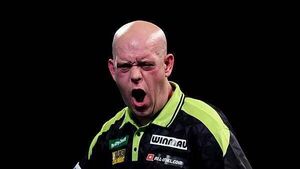 Michael van Gerwen survives scare to reach World Championship second round