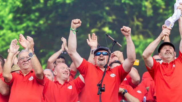 <p>Members of The Timahoe Male Choir performing at this year's Electric Picnic</p>