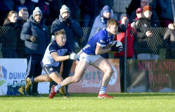Conor Heffernan (Laois) shakes off this despairing tackle by Dublin's Jack Lundy in the opening round of the O'Byrne Cup at Ratheniska GAA on Saturday Photo: Denis Byrne Conor Heffernan (Laois) shakes off this despairing tackle by Dublin's Jack Lundy in the opening round of the O'Byrne Cup at Ratheniska GAA on Saturday Photo: Denis Byrne