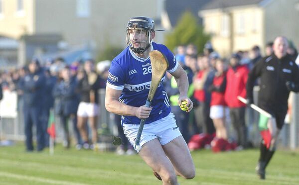 Aaron Dunphy (Laois) in possession and breaking against Wexford Photo: Denis Byrne