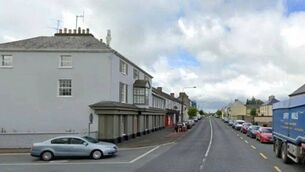 <p>The dangerous stretch of footpath on Main Street was described as 'brutal' at a council meeting. File image</p>