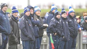<p>The Laois senior hurling backrrom team keep a watchful eye on proceedings against Kilkenny in Rathdowney on Sunday Photo: Denis Byrne</p>