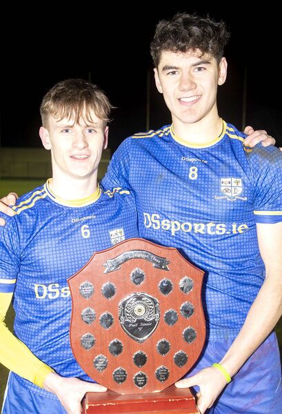 Aidan Byrne and Oisin Hade (Mountmellick CS) holding the South Leinster Senior Football D Plaque Photo: Denis Byrne