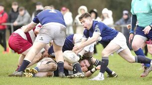 <p>Jake Byrne (Portlaoise) gets the ball away from this ruck in their Leinster League win over Portarlington at Togher on Sunday 	 Photo: Denis Byrne</p>
