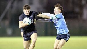 <p>Kevin Swayne from SETU Carlow brushes off this tackle from Jack Law in their opening round Trench Cup win over South West College</p>