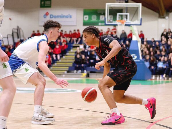 St Mary's Jayden Umeh with Augustine Farrell of Coláiste Eanna sticking close	Photo: ©INPHO/Tom O'Hanlon