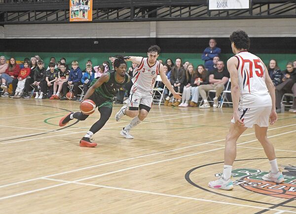 Portlaoise Panthers' Amiri Stewart drives at the heart of the Templeogue defence Photo: David Maher