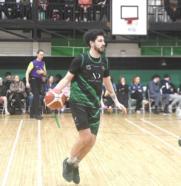 Portlaoise Panthers' Kyle Burke checks his options against Templeogue Photo: David Maher