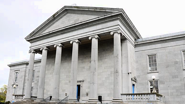Woman allegedly attacked by husband in front of their children tells court 'I love him to bits'