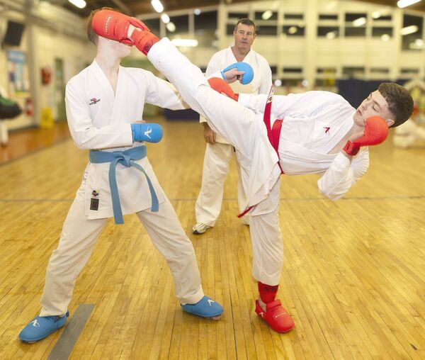 Brian Keating (right) the IMAC Outstanding Senior Athlete of the Year 2025 from the Carlow Karate Club with Patsy Whelan (chief instructor) and training partner Sean McNally Photo: © Michael O'Rourke Photography