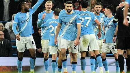 Man City ease past Fulham to move within three points of leaders Arsenal