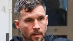 <p>Garrett Pollock, 35, is among two men charged with the possession of explosives in Laois </p>