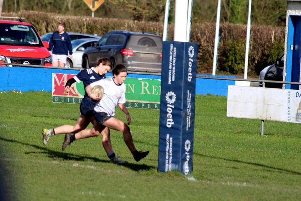 Portlaoise outhalf Niamh Griffin races in for a try in the defeat of UCD J1 last weekend