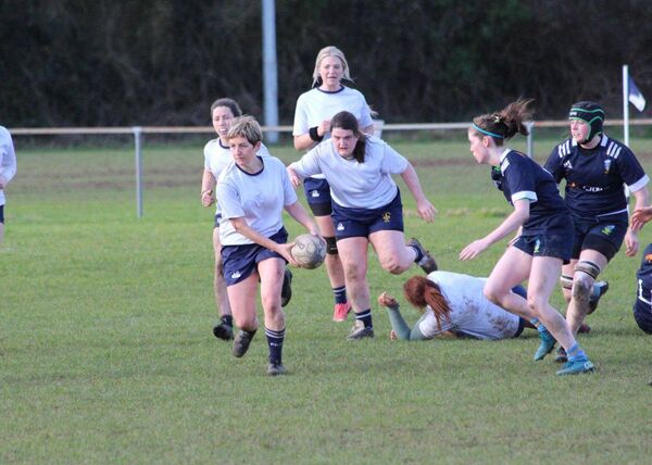 Portlaoise's Amanda Hade breaks and spreads the ball wide against UCD J1
