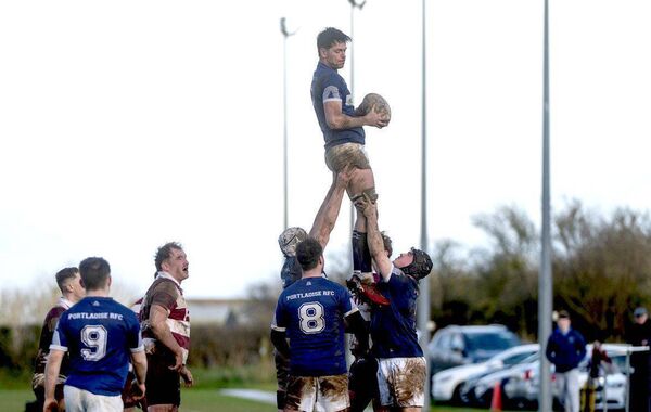 Cormac Rigney rises to secure this lineout for Portlaoise against Portarlington Photo: Denis Byrne