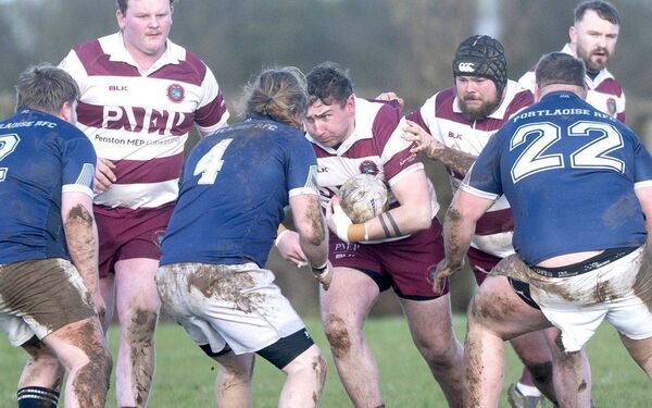 Fintan Murphy (Portarlington) drives at the hearty of the Portlaoise defence on Sunday Photo: Denis Byrne