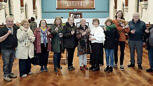 <p>The 11 artists with their chockolate bone-shaped treats are Kevin McCann (curator) Antoinette Breen, Mary Slevin, Kate Knowles, Kathleen Gilligan, Margaret Deegan, Mauri Byrne, Aisling Conroy (standing in for her mother Marie Conroy) Mark Fisher with exhibition mascott Holden) Liam Phelan and Mike Rafter Photo: Stan Henderson</p>