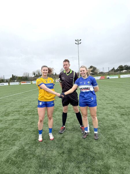 Clare captain Joanna Doohan and Laois captain Andrea Moran with referee Patrick Smith prior to throw-in at Clarecastle on Sunday Clare captain Joanna Doohan and Laois captain Andrea Moran with referee Patrick Smith prior to throw-in at Clarecastle on Sunday