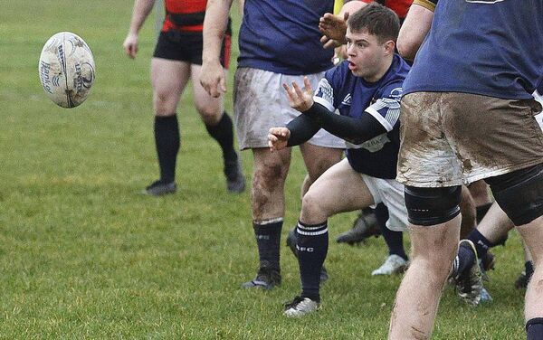 Portlaoise scrumhalf Jake Byrne brisk play kept the Portlaoise backline moving 	Photo: David Maher