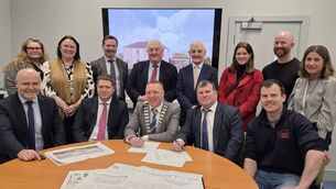 <p>Pictured at the contract signing for the Borris-in-Ossory courthouse redevelopment are Lesley Cowper (Town Regeneration Section, LCC), Angela McEvoy, LCC Director of Services, senior engineer Ken Morley (Town Regeneration Section LCC), Cllr. John King, Cllr. James Kelly, Lucy OConnor and Patrick Tyrrell (Howley Hayes Cooney Architecture),Catherine Guidera (Town Regeneration Section, LCC), chief executive Michael Rainey, district chair Cllr Conor Bergin and council chair Cllr Barry Walsh, with Terry and Jonathan Higgins of Braemar Construction Ltd</p>