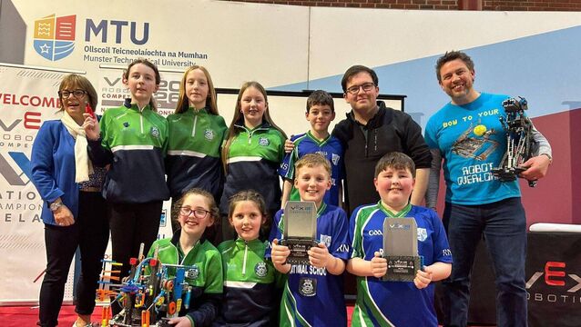 <p>Rosenallis NS students with teacher Aaron Mackessy and Laois Co Council STEM officer Seanie Morris</p>