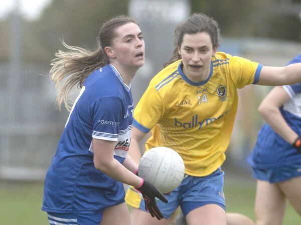 Laois's Shifra Havill making ground on goal with Rosie Lennon (Roscommon) staying close Photo: Denis Byrne Laois's Shifra Havill making ground on goal with Rosie Lennon (Roscommon) staying close Photo: Denis Byrne