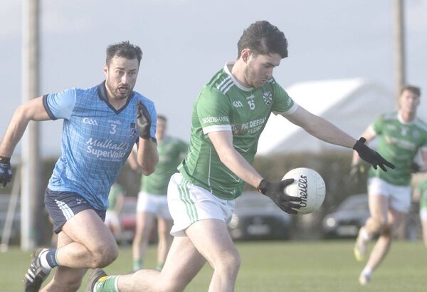 Fionn McEvoy (Stradbally) gets away from Conor Brennan (Ballyroan Abbey) on Saturday 	 Photo Denis Byrne