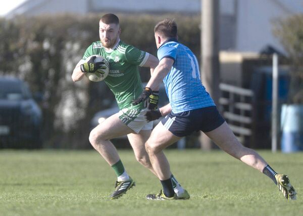 James Devoy (Stradbally) looks to break against Ballyroan Abbey on Saturday 	Photo: Denis Byrne