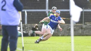<p>Laois's Tomas Keyes retains possession despite this challenge from Meath's Jarlath Ennis in the National Hurling League game at Laois Hire O'Moore Park on Sunday Photo: Denis Byrne</p>