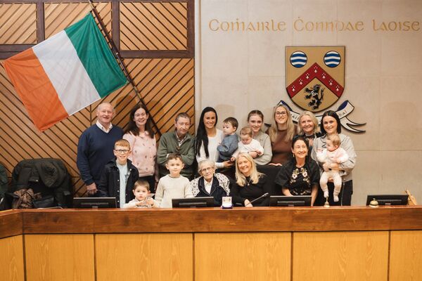 Breda Fitzpatrick with her family in Council chambers.