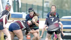 <p>Scoil Chríost Rí Captain Lily Brophy leading the charge against Ardscoil Tríonóide in the Leinster Rugby Girls Schools Senior Cup semi-final in Clane on Thursday 	 Photo: Aisling Hyland </p>