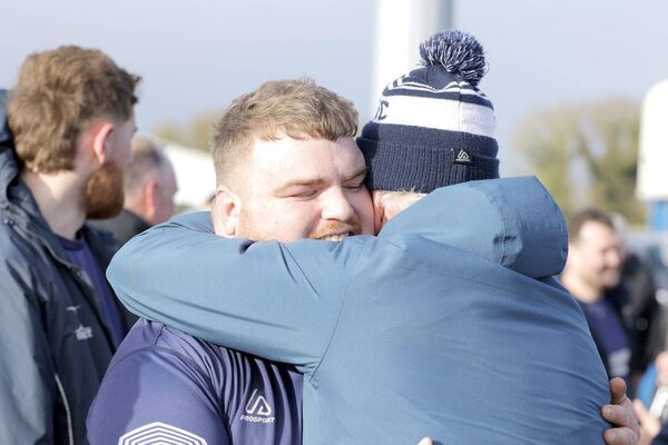 Paddy Coss is congratulated by Lar Hogan Paddy Coss is congratulated by Lar Hogan