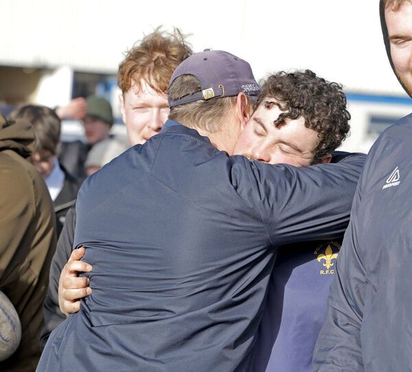 Congratulatory hug for Aran Coiley