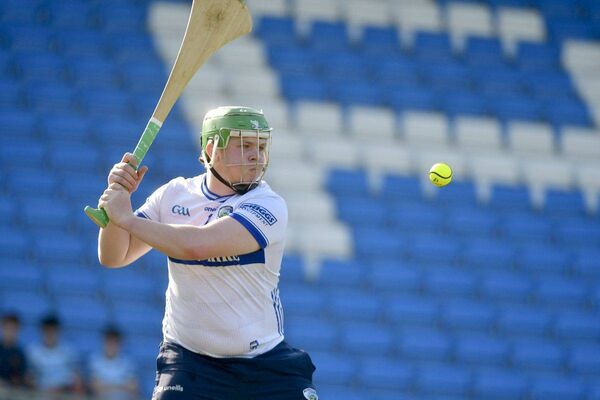 Laois's Ryan Keeshan clearing his lines against Kerry Photo: Denis Byrne