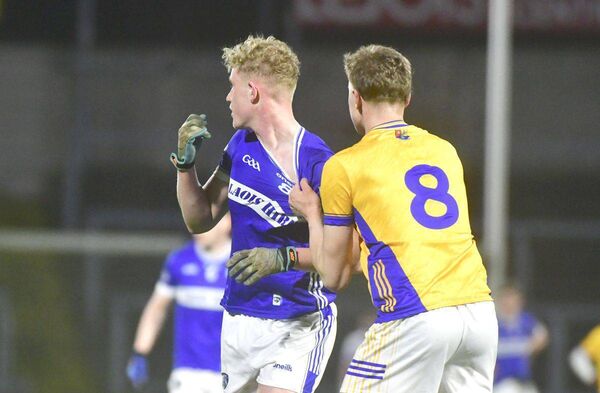 Robbie Murphy (Laois) having his jersey tested by Daniel Galvin (Longford) during their U/20 football championship game Photo: Denis Byrne