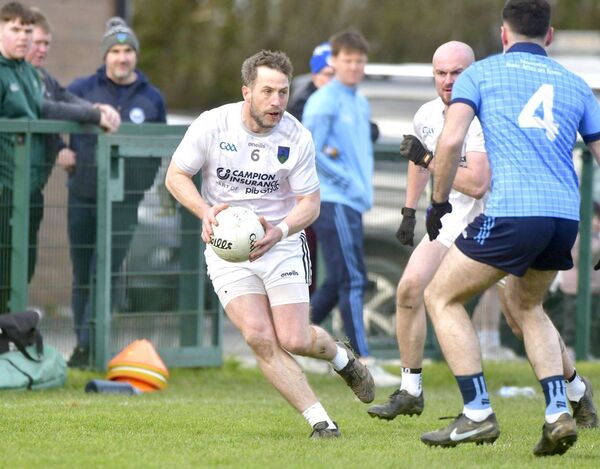 Courtwood's Robbie O'Flynn breaking against Ballyroan Abbey Photo: Denis Byrne
