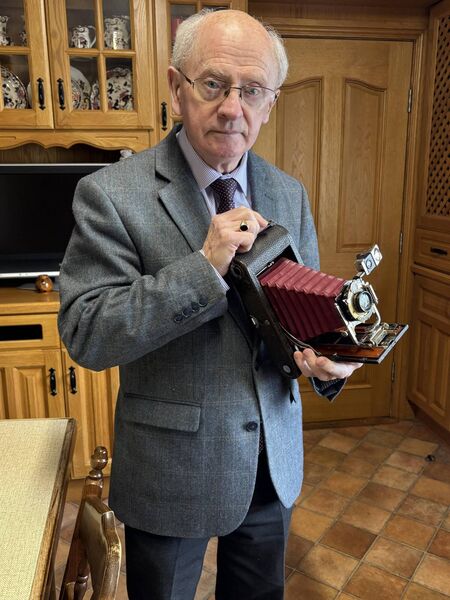 Michael with one of his many vintage cameras Michael with one of his many vintage cameras