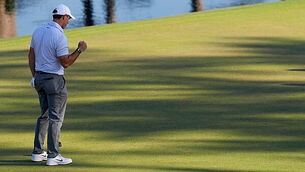 Crowds cheer on as Grand National winner crosses the line
