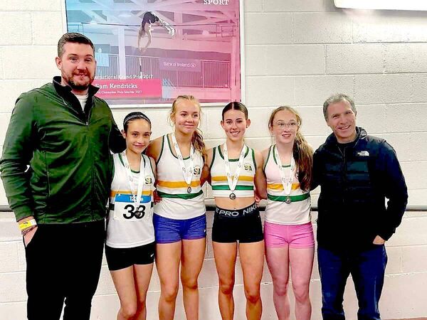 The girls relay team pictured with their coaches Eoin and Nico
