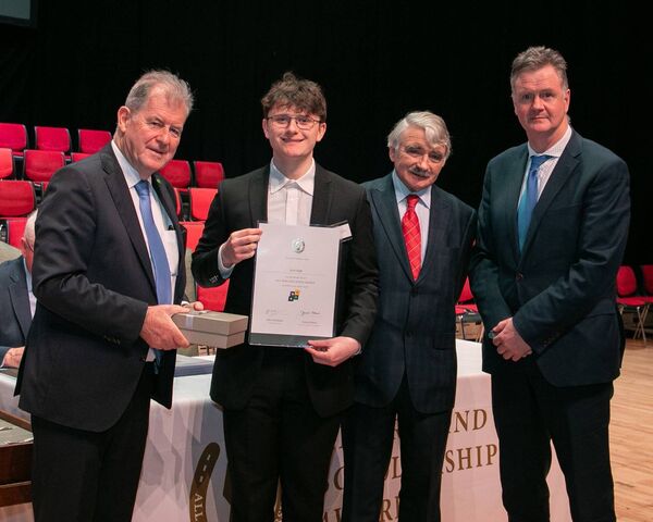 Pictured (L-R): Sponsor JP McManus, All Ireland scholarship winner Scott Duffy, Deputy Willie O'Dea TD, and Principal of Portlaoise College Noel Daly.
