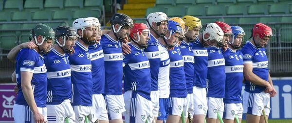 The Laois senior hurling team stand for Amhrán na bhFiann at Netwatch Cullen Park prior to the first round of the Joe McDonagh Cup on Saturday 	Photo: Denis Byrne