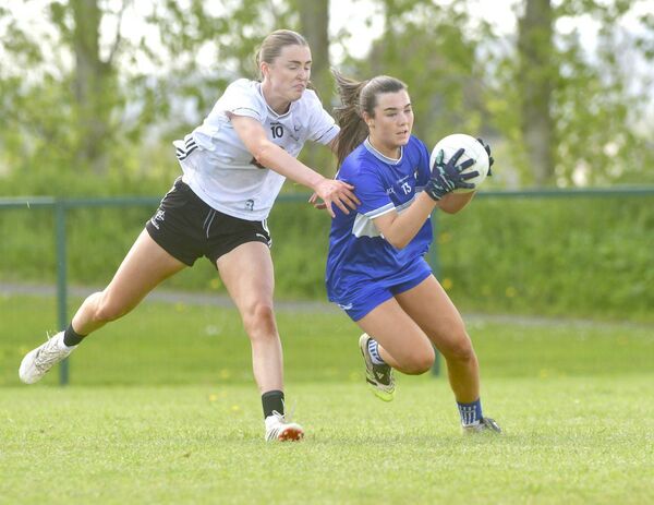 Aideen Gee (Laois) evades this tackle from Kildare's Emily Gallagher in their Leinster Minor Championship semi-final on Sunday Photo: Denis Byrne