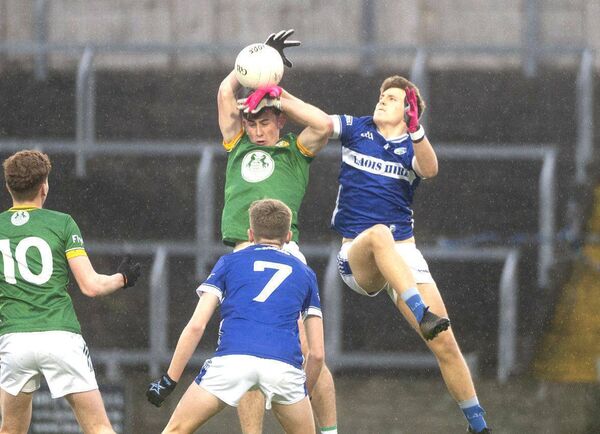 Darragh Brennan (Laois) challenges Harry McQuirke (Meath) for possession of this ball during their Leinster Minor Football Championship game at Laois Hire O'Moore Park on Tuesday 	 Photo: Denis Byrne
