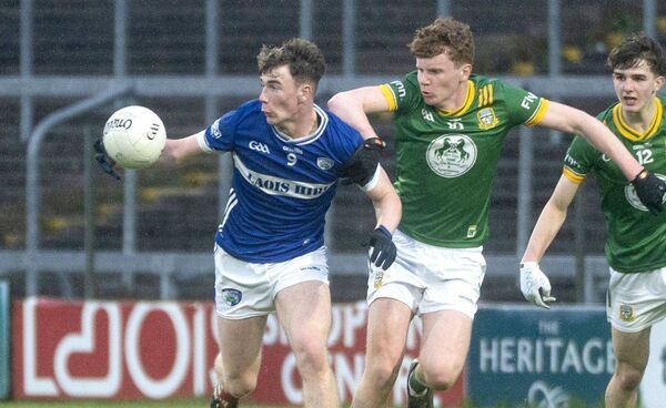 Cillin Hoey (Laois) gathers this ball despite being put under pressure 	 Photo: Denis Byrne